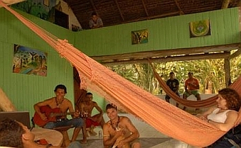 Picture by Tony Annis: Benki and friends at his home with the Ashaninkas